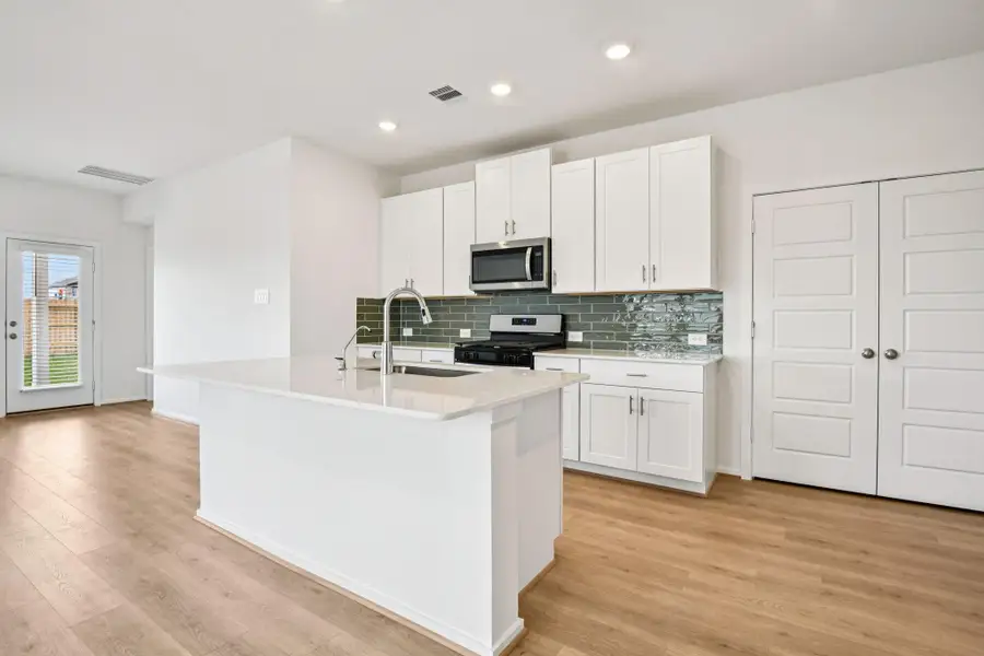 Furnished interior view inside a new home in Landing Meadows - Traditional Series, New Caney (Image 12).