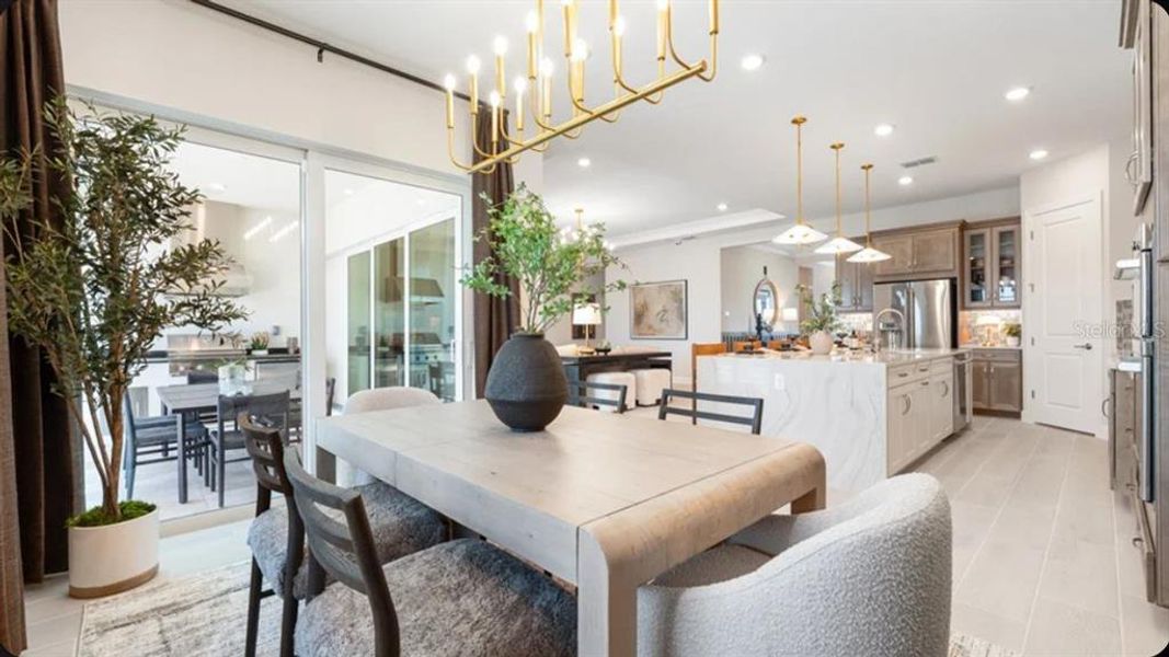Furnished interior view inside a new home in Esplanade at McKinnon Groves, Winter Garden (Image 7).