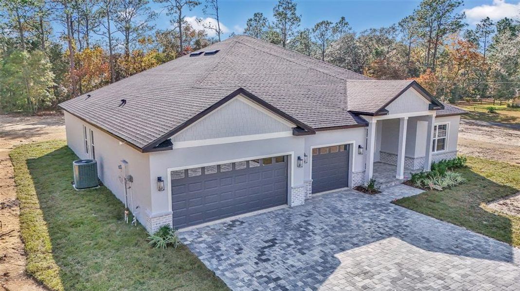 Front exterior of a new home in , Beverly Hills, FL, highlighting curb appeal (Image 22). Front exterior of a new home in , Beverly Hills, FL, highlighting curb appeal (Image 22).