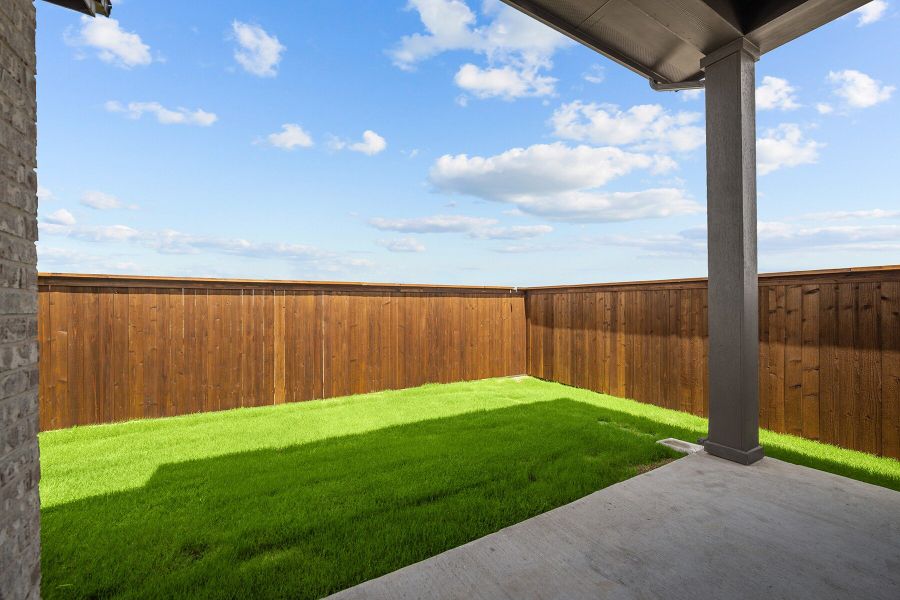 Exterior details and patio area of a home in Creekshaw – Gardens, Royse City (Image 3).
