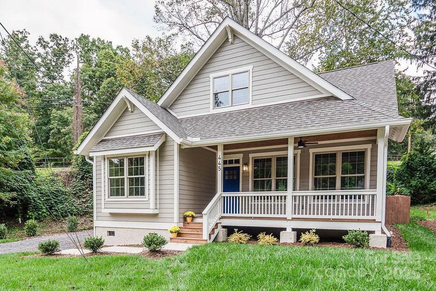 Front exterior of a new home in , Asheville, NC, highlighting curb appeal (Image 1).