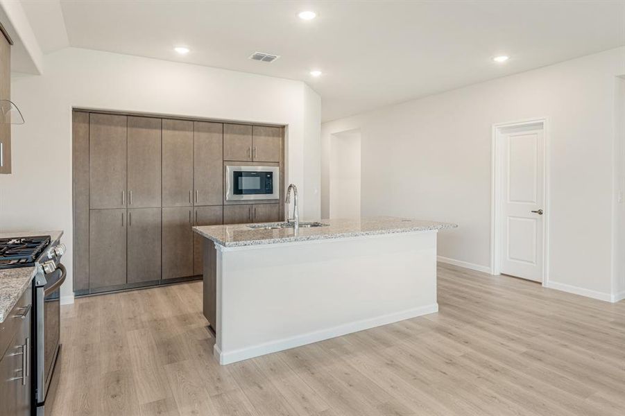 Furnished interior view inside a new home in Eagle Glen Elements, Alvarado (Image 9). Furnished interior view inside a new home in Eagle Glen Elements, Alvarado (Image 9).