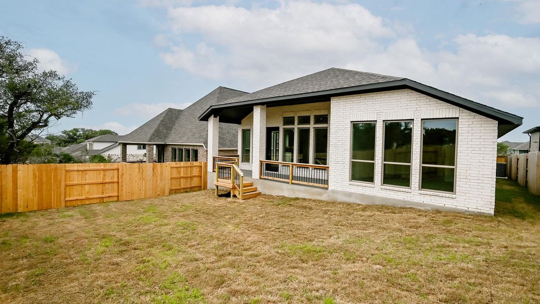 Exterior details and patio area of a home in La Cima 50', San Marcos (Image 16).
