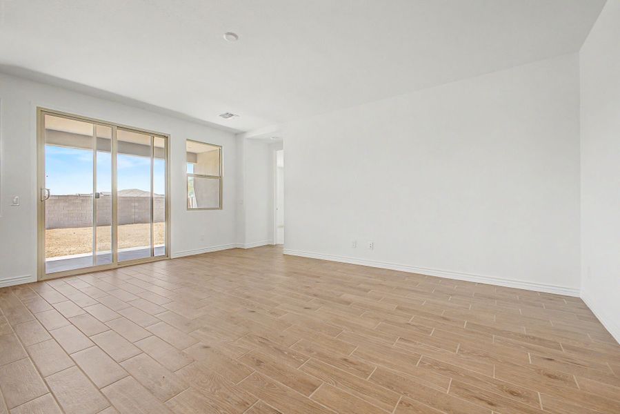 Spacious, unfurnished interior of a new home in Miravida, Surprise (Image 9).
