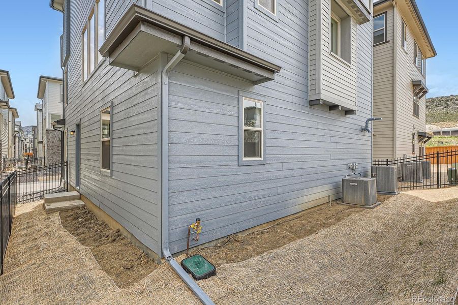 Front exterior of a new home in Red Rocks Ranch: The Skyline Collection, Morrison, CO, highlighting curb appeal (Image 1).