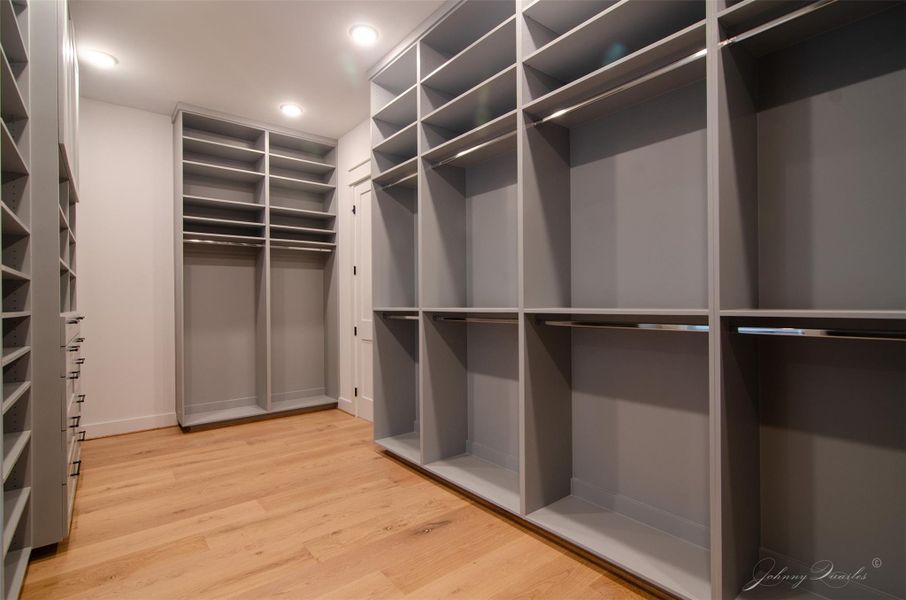 This Primary Closet is larger than a lot of bedrooms with over 40 feet of hanging space and shelving you should never run out of room for purses and shoes. This Primary Closet is larger than a lot of bedrooms with over 40 feet of hanging space and shelving you should never run out of room for purses and shoes.
