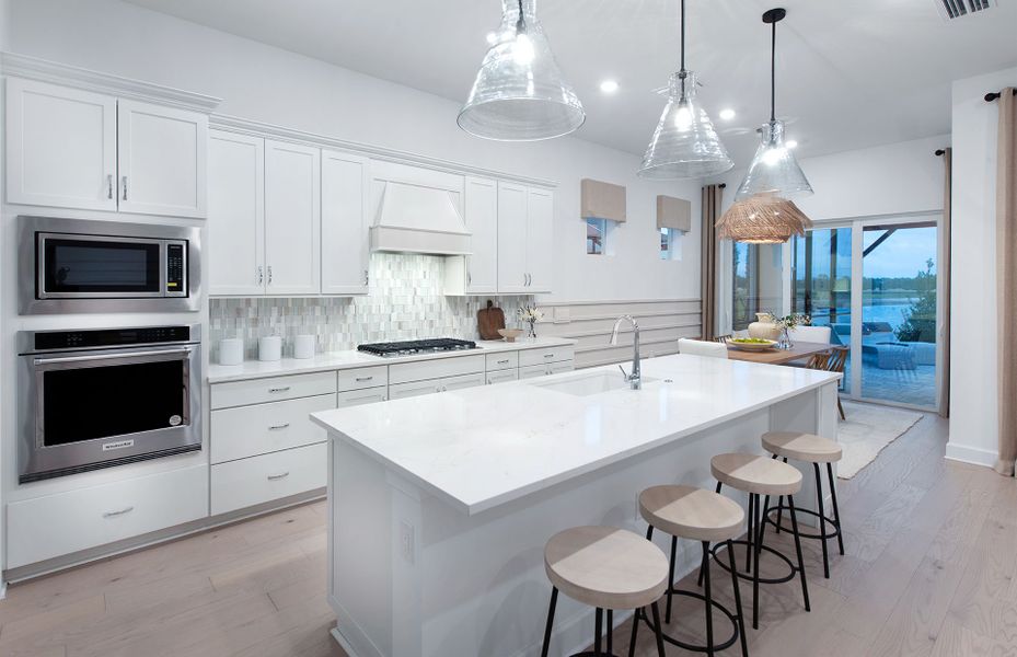 Kitchen with stainless steel appliances and large center island