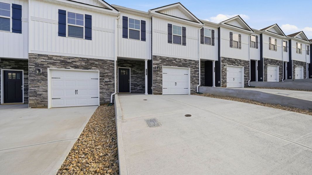 Front exterior of a new home in The Arbor Townhomes, Kingsport, TN, highlighting curb appeal (Image 14).