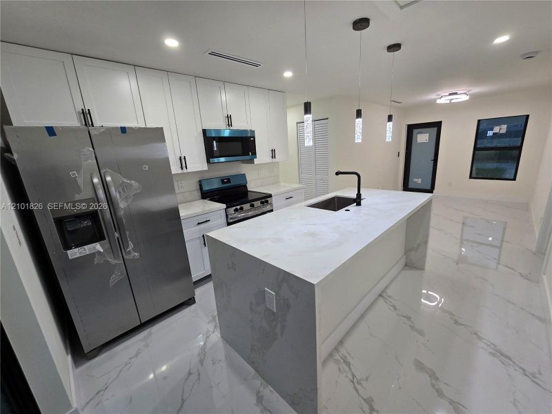 Furnished interior view inside a new home in , Lehigh Acres (Image 6).