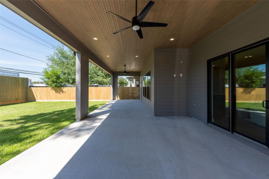 Exterior details and patio area of a home in , Houston (Image 3).