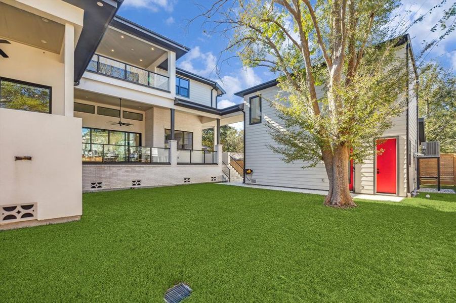 The large backyard will accommodate a pool with left over green space for pets and play.  There is a full bathroom through the red door off the garage.