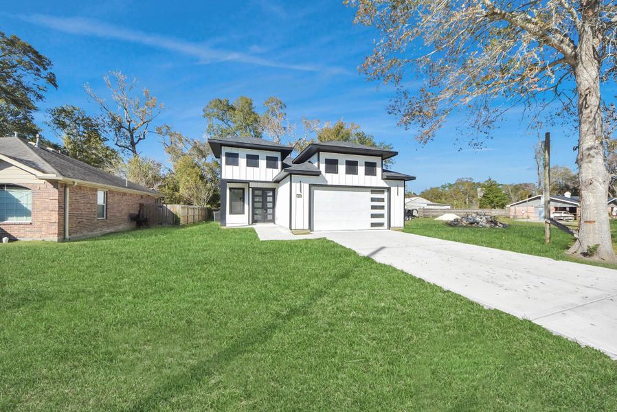 Front exterior of a new home in , Dayton, TX, highlighting curb appeal (Image 1). Front exterior of a new home in , Dayton, TX, highlighting curb appeal (Image 1).