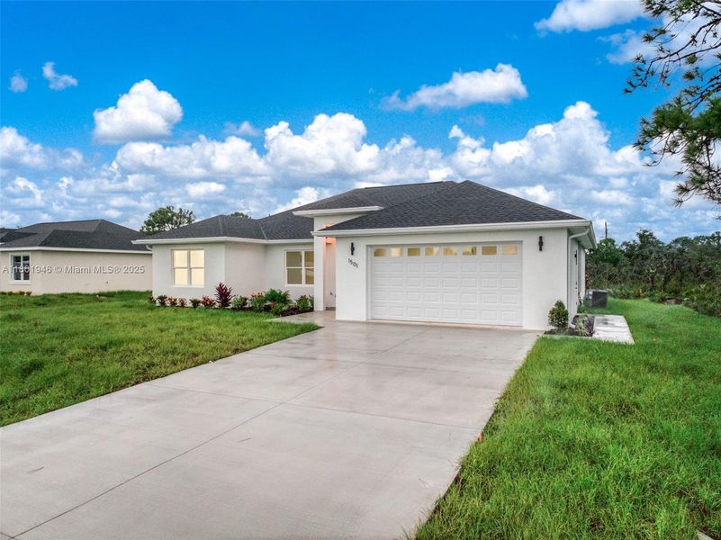 Front exterior of a new home in , Sebring, FL, highlighting curb appeal (Image 24).