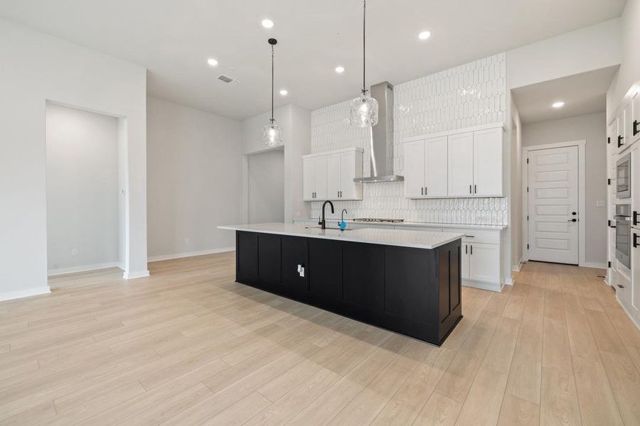 Furnished interior view inside a new home in Capitol Collection at Lariat, Liberty Hill (Image 5). Furnished interior view inside a new home in Capitol Collection at Lariat, Liberty Hill (Image 5).