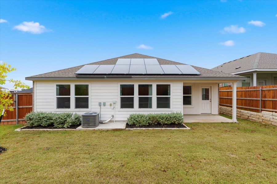 Exterior details and patio area of a home in Thunder Rock: Watermill Collection, Marble Falls (Image 3).