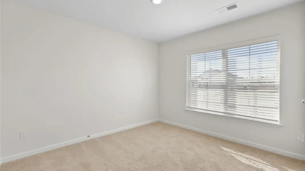 Spacious, unfurnished interior of a new home in Neal Place, Stokesdale (Image 10). Spacious, unfurnished interior of a new home in Neal Place, Stokesdale (Image 10).
