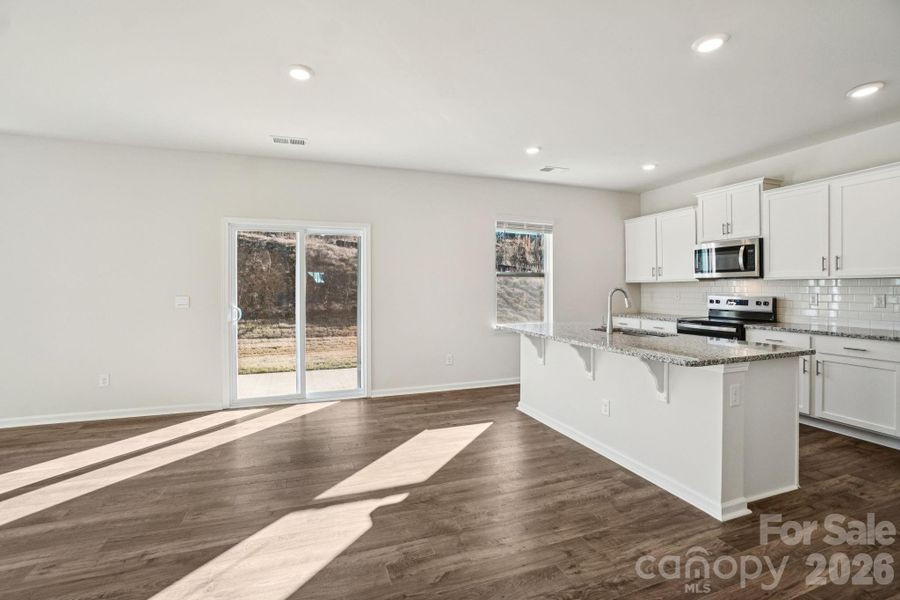 Spacious, unfurnished interior of a new home in Rydele Heights, Asheville (Image 17).