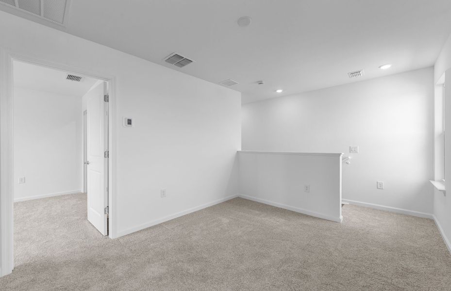 Representative unfurnished interior of a home built from the Mabel II with ADU by Pulte Homes in SeaFlower, Bradenton (Image 52).
