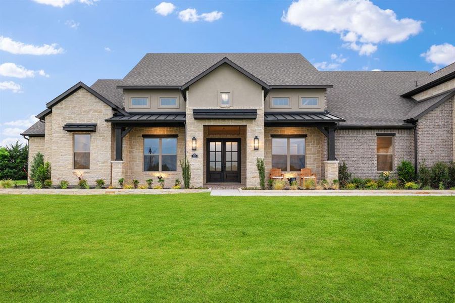 Front exterior of a new home in Chapel View, Heath, TX, highlighting curb appeal (Image 23). Front exterior of a new home in Chapel View, Heath, TX, highlighting curb appeal (Image 23).