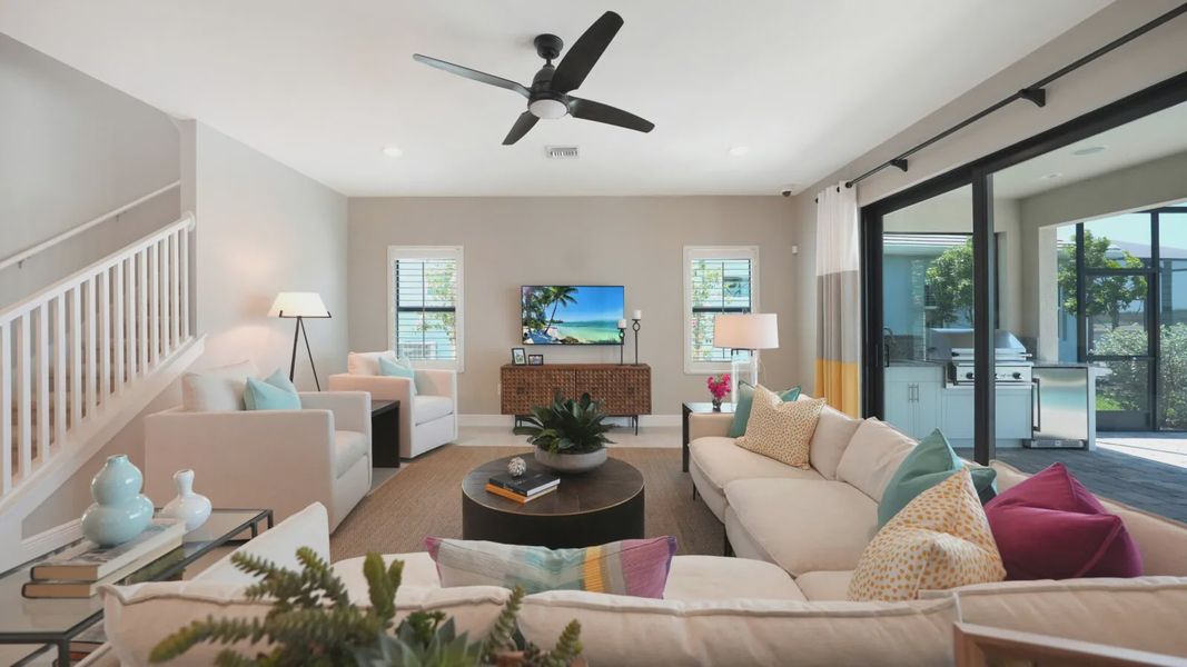 Representative furnished interior of a home built from the Artistry by Neal Communities in SkySail, Naples (Image 20).