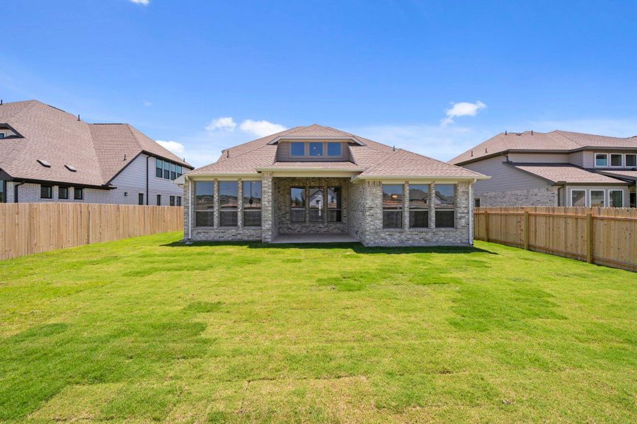 Rear of Home and Private Backyard