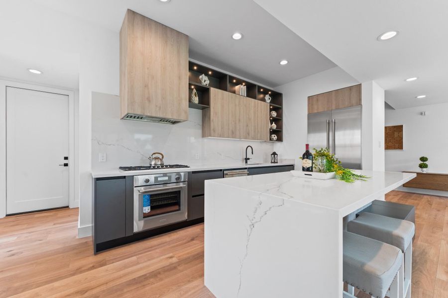 Practical luxury: direct garage, pantry, and utility access makes unloading easy without sacrificing one inch of style. Practical luxury: direct garage, pantry, and utility access makes unloading easy without sacrificing one inch of style.