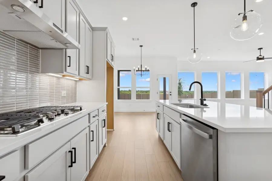 Furnished interior view inside a new home in Double Creek Crossing – Classic Series, Round Rock (Image 7).