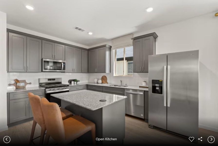 Photo of Pulte model home with same floor plan, not of actual home listed.