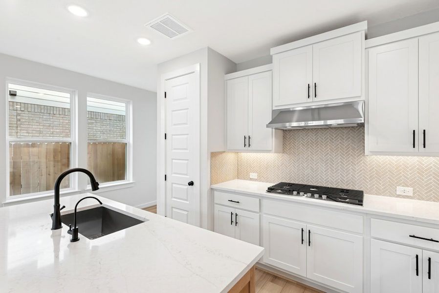 Furnished interior view inside a new home in University Heights, Round Rock (Image 10).