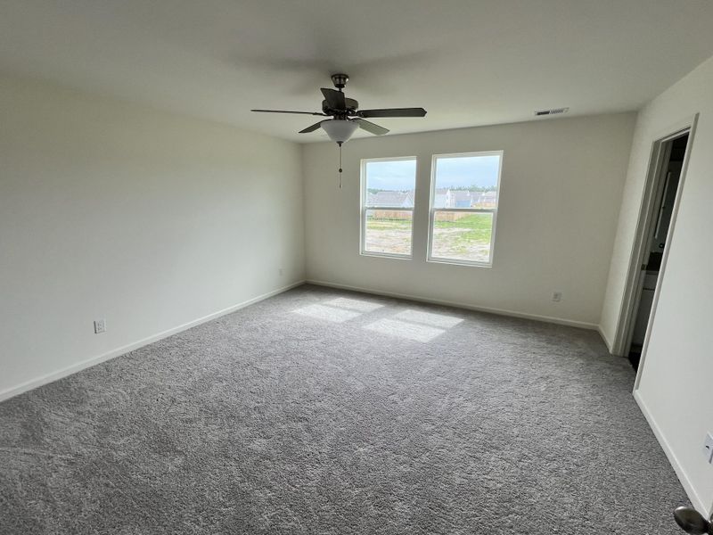 Spacious, unfurnished interior of a new home in Crossing at Givhans, Ridgeville (Image 6).