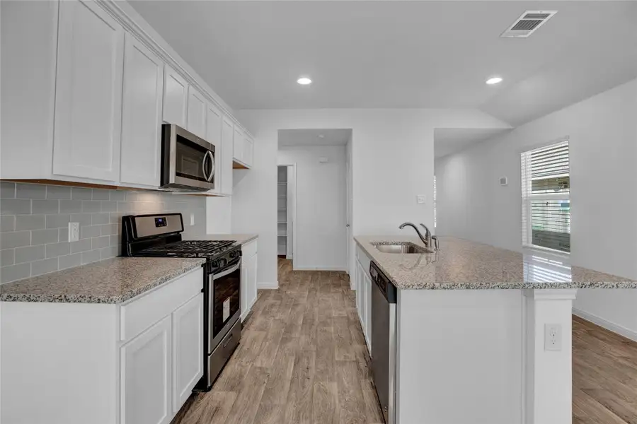 Furnished interior view inside a new home in Southgrove, Kyle (Image 5).