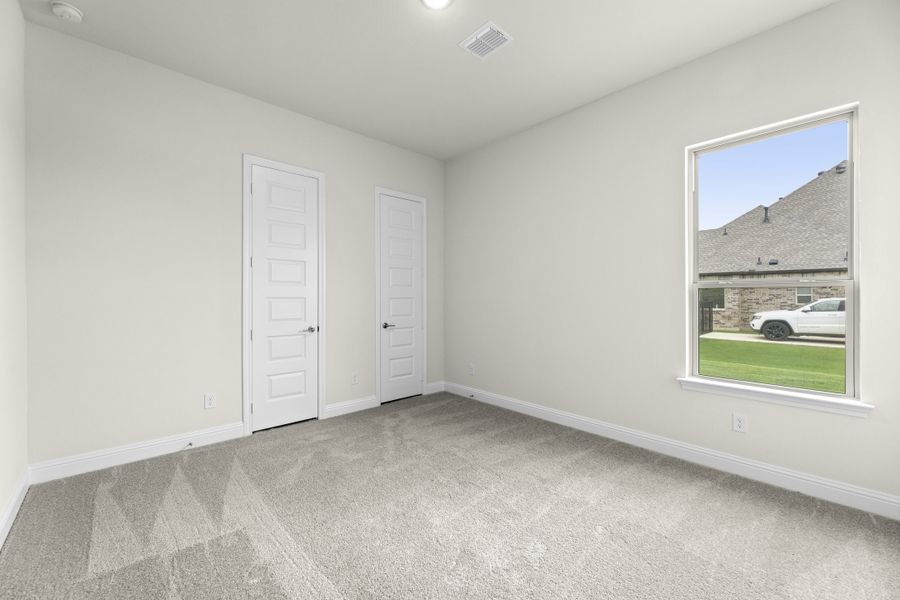 Representative unfurnished interior of a home built from the Wildwood SE by Sandlin Homes in Settler's Glen, New Fairview (Image 27).