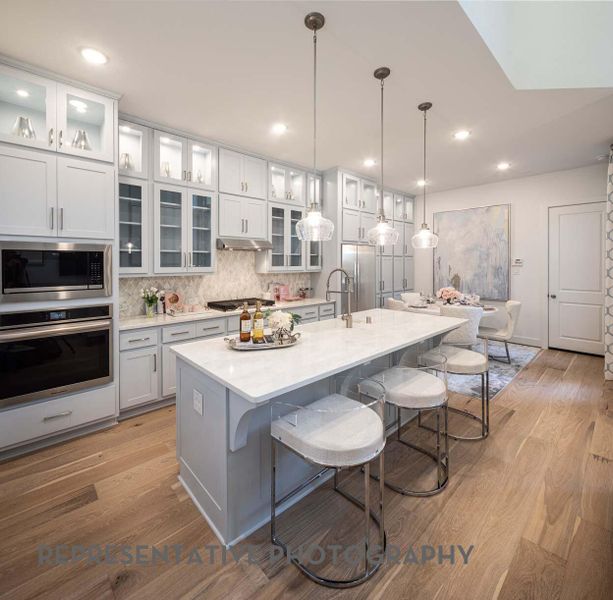 Furnished interior view inside a new home in Bridgeland, Cypress (Image 3).
