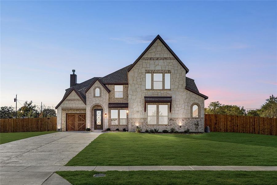 Front exterior of a new home in Crystal Lake Estates, Red Oak, TX, highlighting curb appeal (Image 2). Front exterior of a new home in Crystal Lake Estates, Red Oak, TX, highlighting curb appeal (Image 2).
