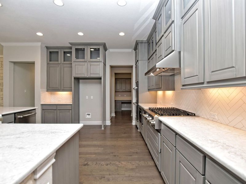 Representative furnished interior of a home built from the Madera II by Giddens Homes in Scofield Farms Estates, Georgetown (Image 192).