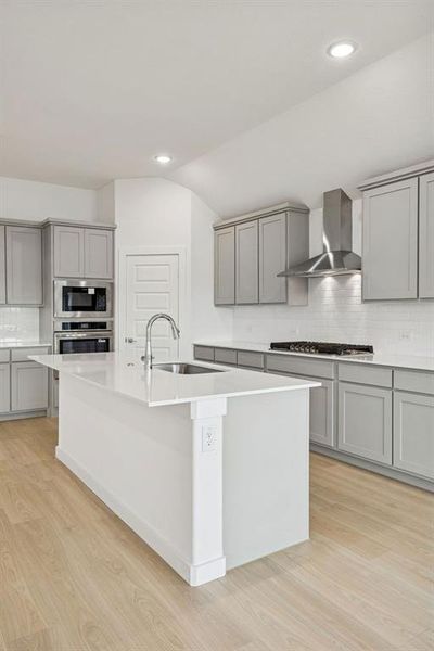 Kitchen in the Gilmour II home plan by Trophy Signature Homes – REPRESENTATIVE PHOTO