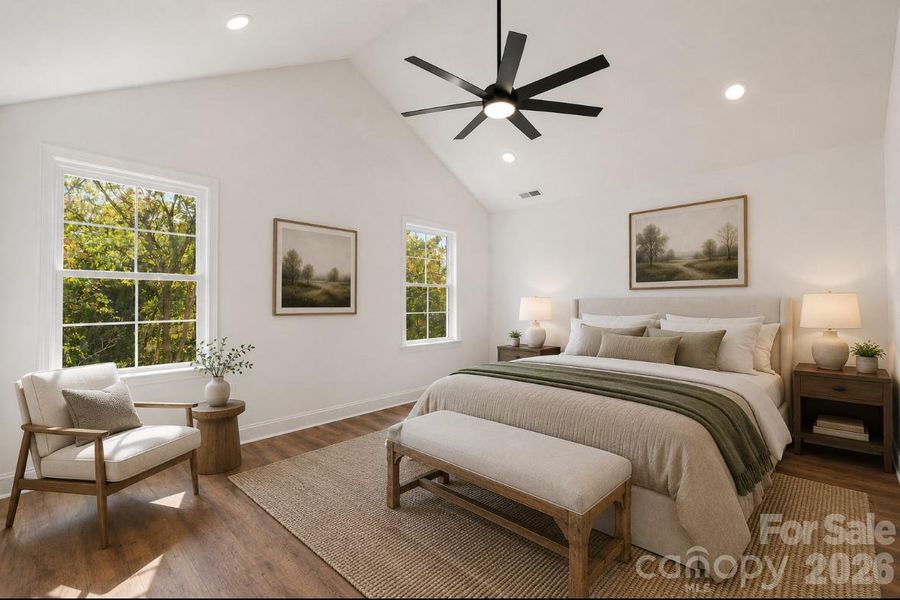 *representative photo- staged primary bedroom w/ vaulted ceiling