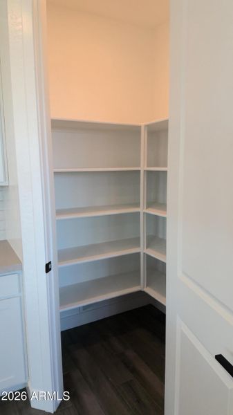 Corner walk-in pantry!