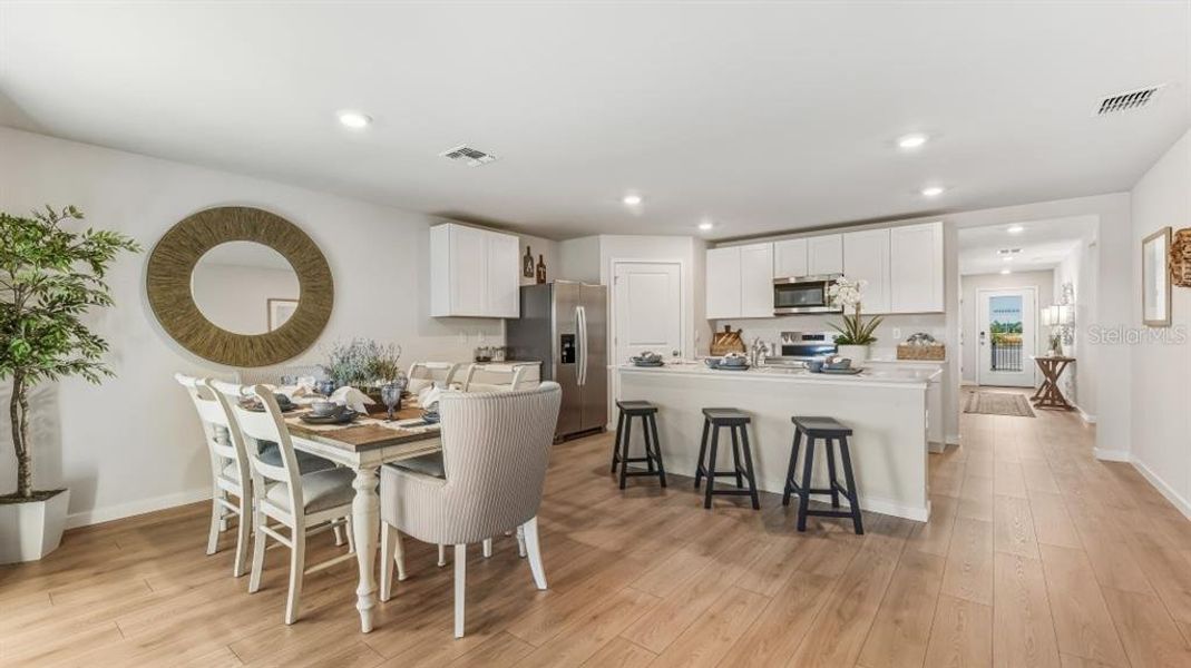 Furnished interior view inside a new home in Seagrass - Express & Tradition, Punta Gorda (Image 11). Furnished interior view inside a new home in Seagrass - Express & Tradition, Punta Gorda (Image 11).