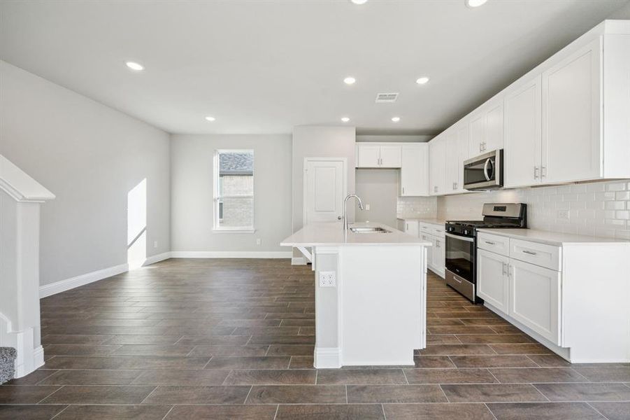 Furnished interior view inside a new home in Venetian, Weston (Image 8).
