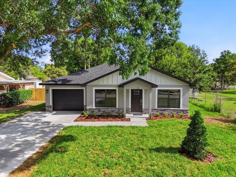Front exterior of a new home in , Auburndale, FL, highlighting curb appeal (Image 29).