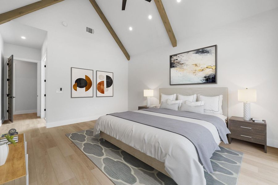 Bedroom with recessed lighting, beamed ceiling, light wood-type flooring, high vaulted ceiling, and baseboards Bedroom with recessed lighting, beamed ceiling, light wood-type flooring, high vaulted ceiling, and baseboards