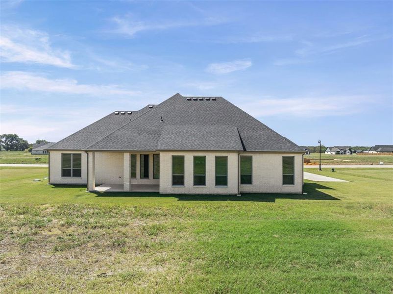 Exterior details and patio area of a home in Waterfall Ranch - 1 Acre Lots, Waxahachie (Image 4). Exterior details and patio area of a home in Waterfall Ranch - 1 Acre Lots, Waxahachie (Image 4).