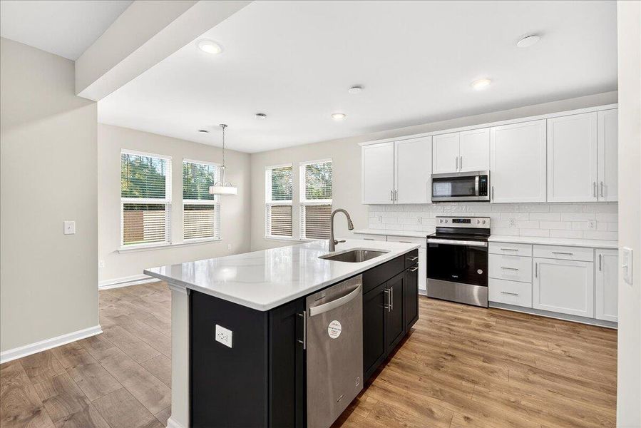 Furnished interior view inside a new home in Jasmine Point at Lakes of Cane Bay, Summerville (Image 14).