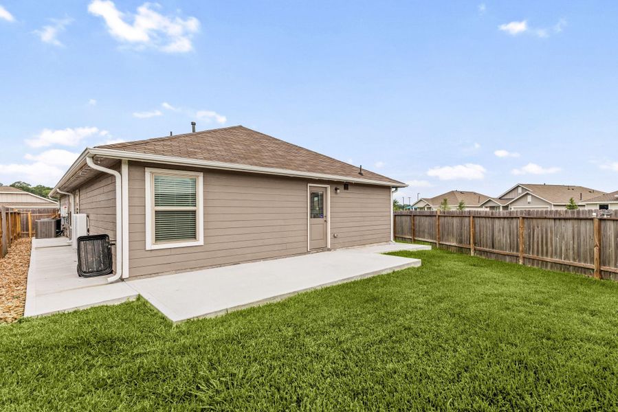 Exterior details and patio area of a home in , Splendora (Image 22).