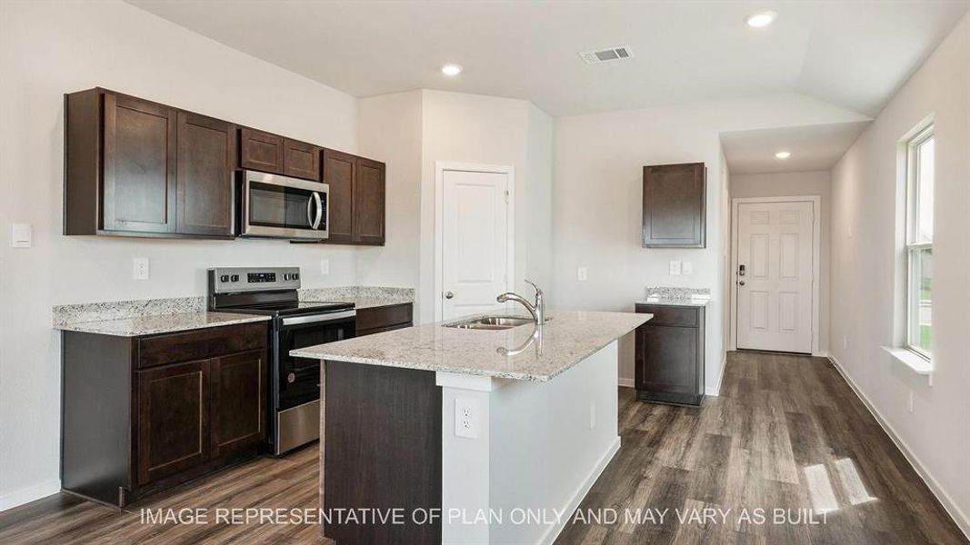 Furnished interior view inside a new home in Midtown Reserve, College Station (Image 2).