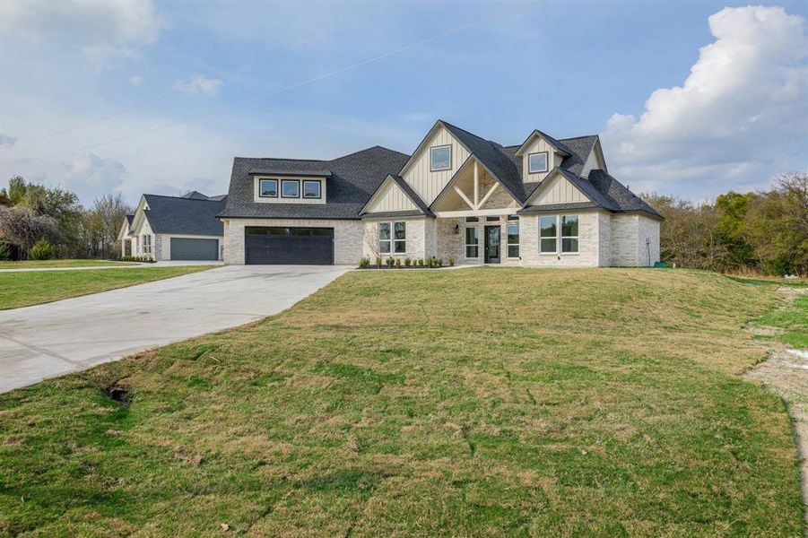 Front exterior of a new home in , Terrell, TX, highlighting curb appeal (Image 21).