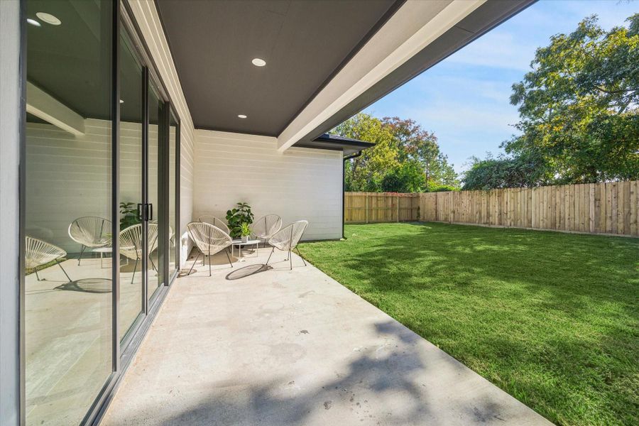 Exterior details and patio area of a home in , Houston (Image 3). Exterior details and patio area of a home in , Houston (Image 3).