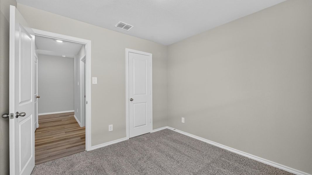 Spacious, unfurnished interior of a new home in The Hills at Reunion, Newark (Image 35).