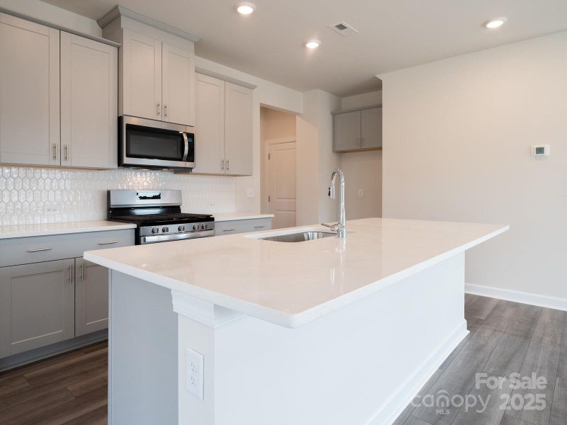 Photo is not of the actual home, but is an inspirational photo of builder’s model home and may depict options, furnishings, and/or decorator features that are not included Photo is not of the actual home, but is an inspirational photo of builder’s model home and may depict options, furnishings, and/or decorator features that are not included